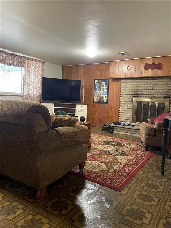 128 Lebanon Church Road Pittsburgh, PA 15236 - Photo 24 of 28 a living room with furniture and a flat screen tv