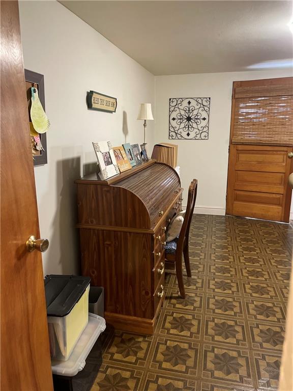 128 Lebanon Church Road Pittsburgh, PA 15236 - Photo 25 of 28 a bedroom with a bed and wooden floor