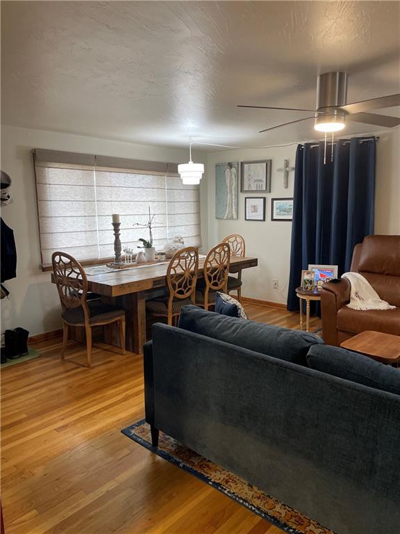128 Lebanon Church Road Pittsburgh, PA 15236 - Photo 5 of 28 a living room with furniture a dining table and a window