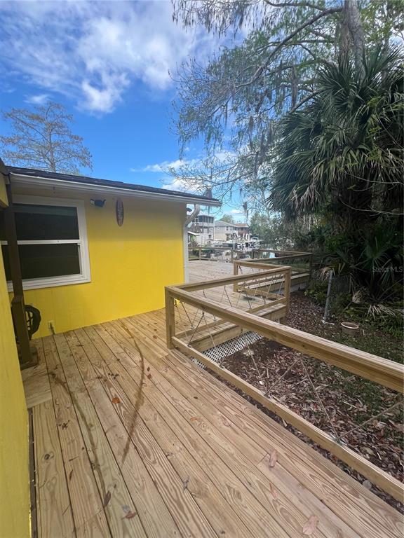 7222 Tropical Drive Weeki Wachee, FL 34607 - Photo 6 of 23 a view of a back yard of the house