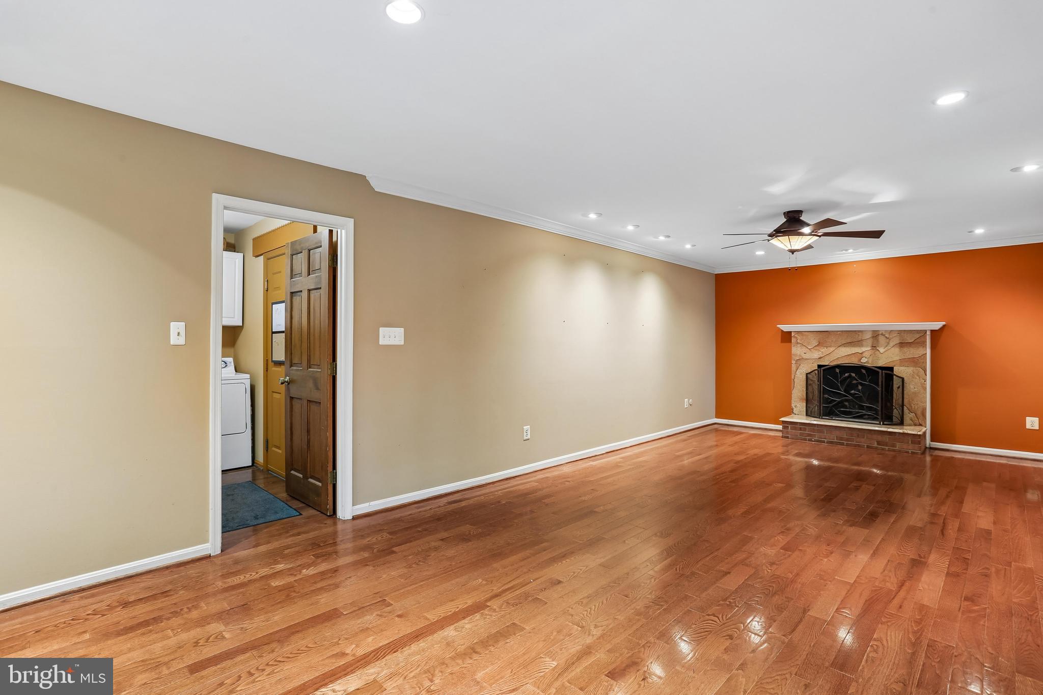 110 Summit Hall Road Gaithersburg, MD 20877 - Photo 13 of 85 Family room w/gleaming hardwoods
