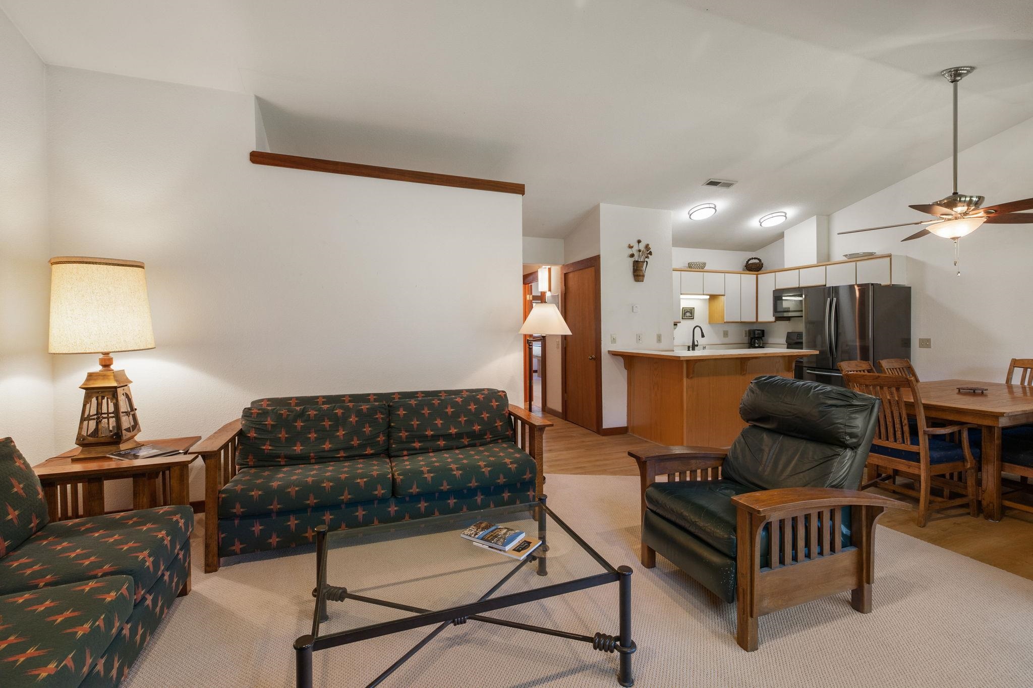 1591 Olympic Vly Road, Unit 29 Olympic Valley, CA 96146 - Photo 12 of 28 a living room with furniture and a lamp