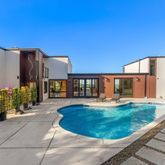 a view of a house with backyard
