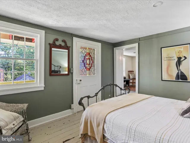 a view of an chairs and table in the patio