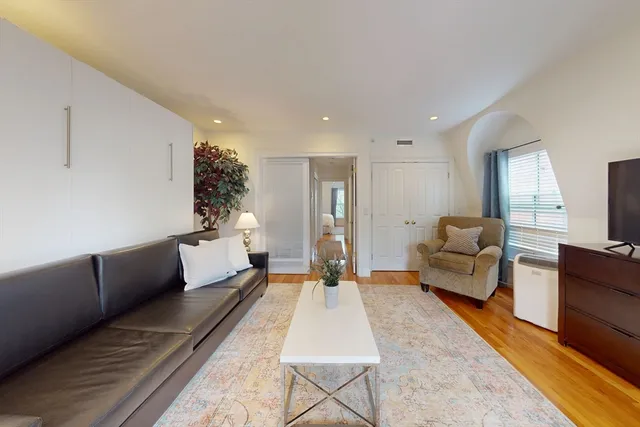 a living room with furniture and a couch