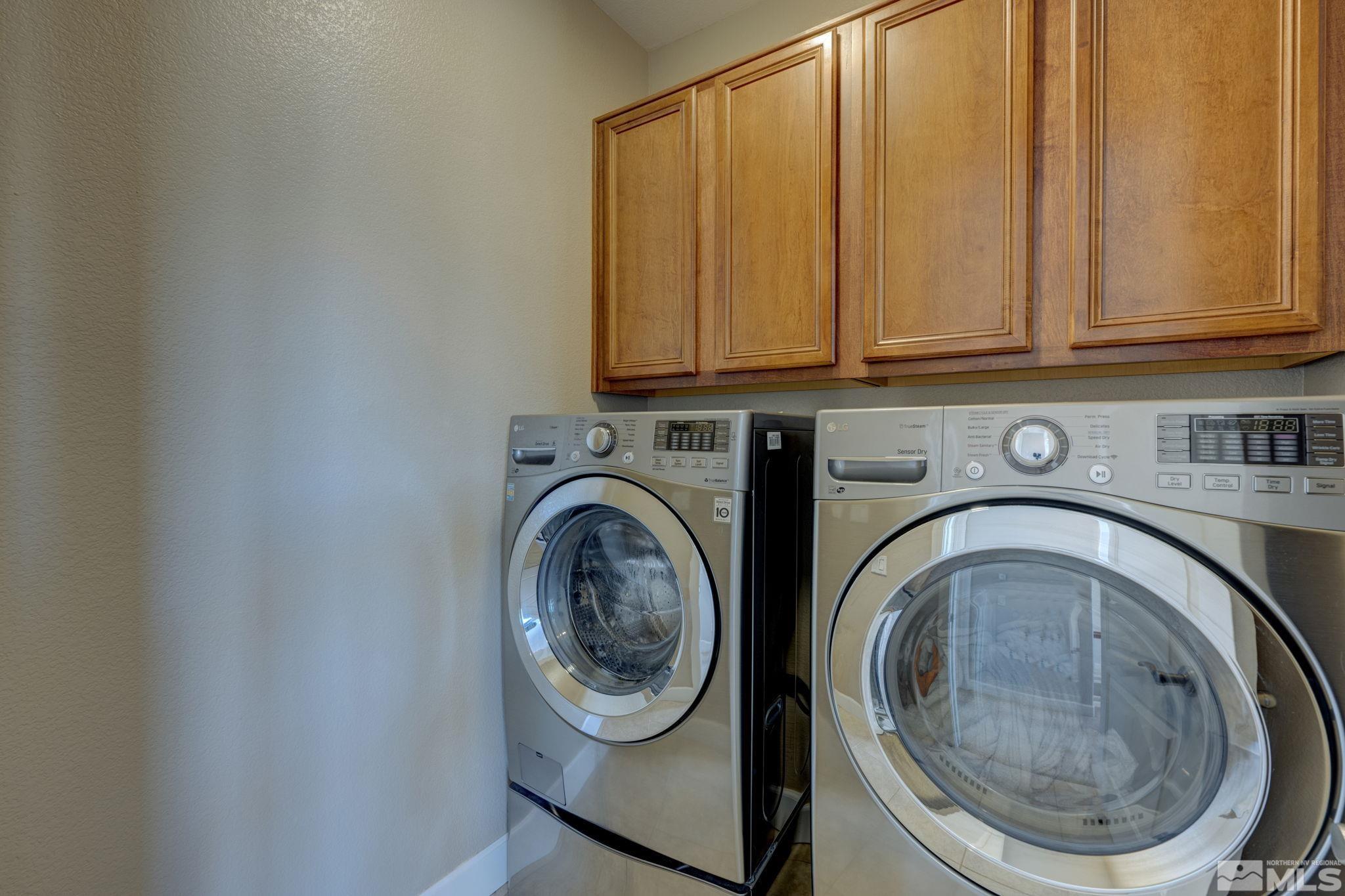 7669 Stone Bluff Way Reno, NV 89523 - Photo 20 of 40 a utility room with dryer and washer