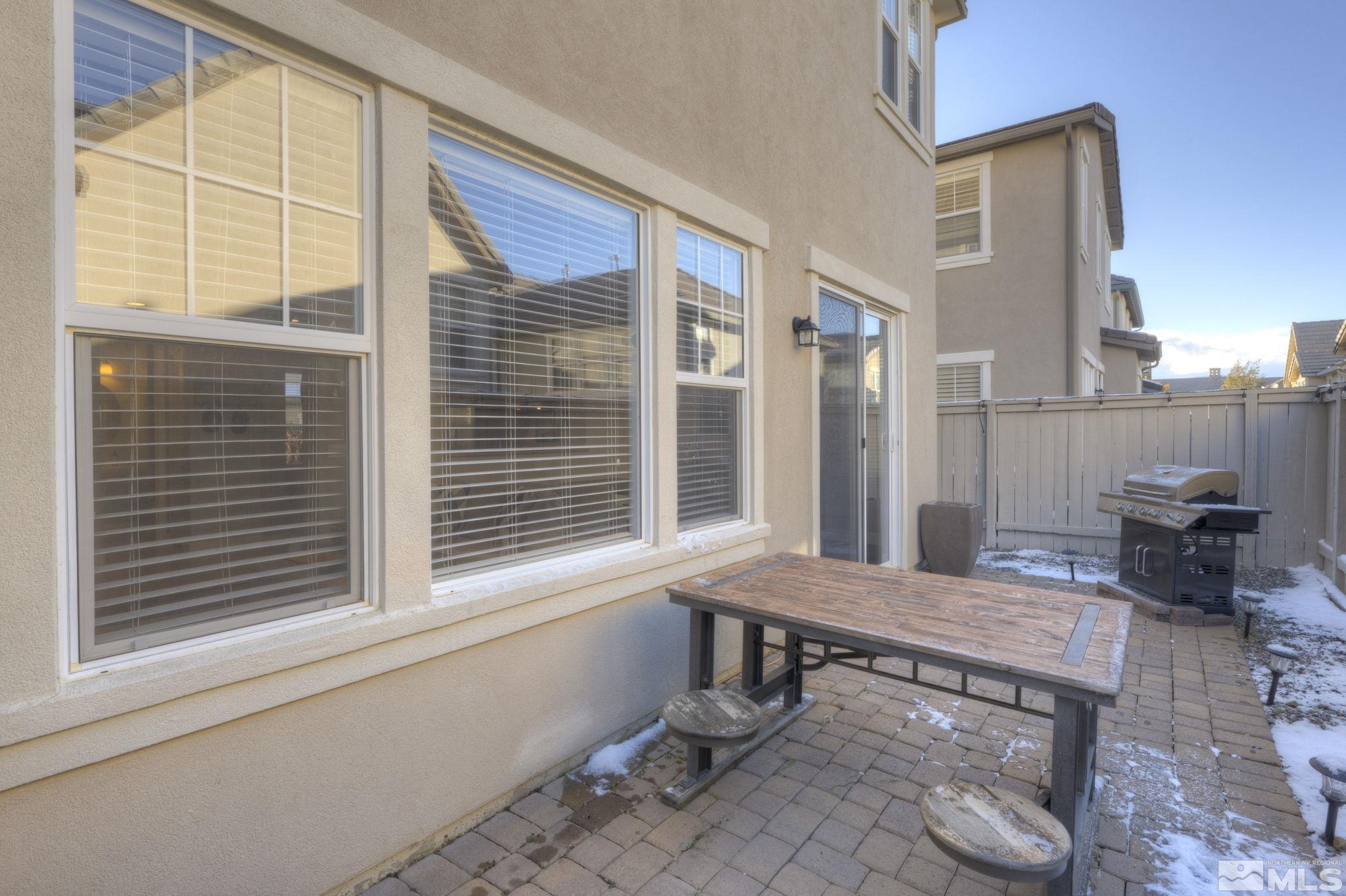 7669 Stone Bluff Way Reno, NV 89523 - Photo 34 of 40 a view of a house with outdoor seating