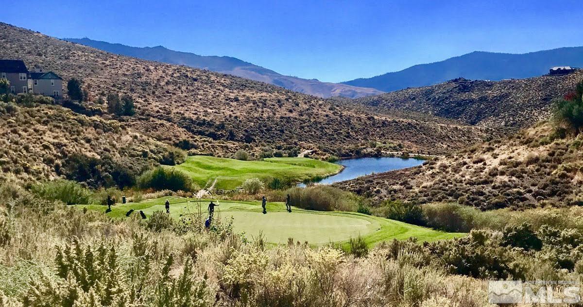 7669 Stone Bluff Way Reno, NV 89523 - Photo 36 of 40 a view of a lush green hillside and a mountain