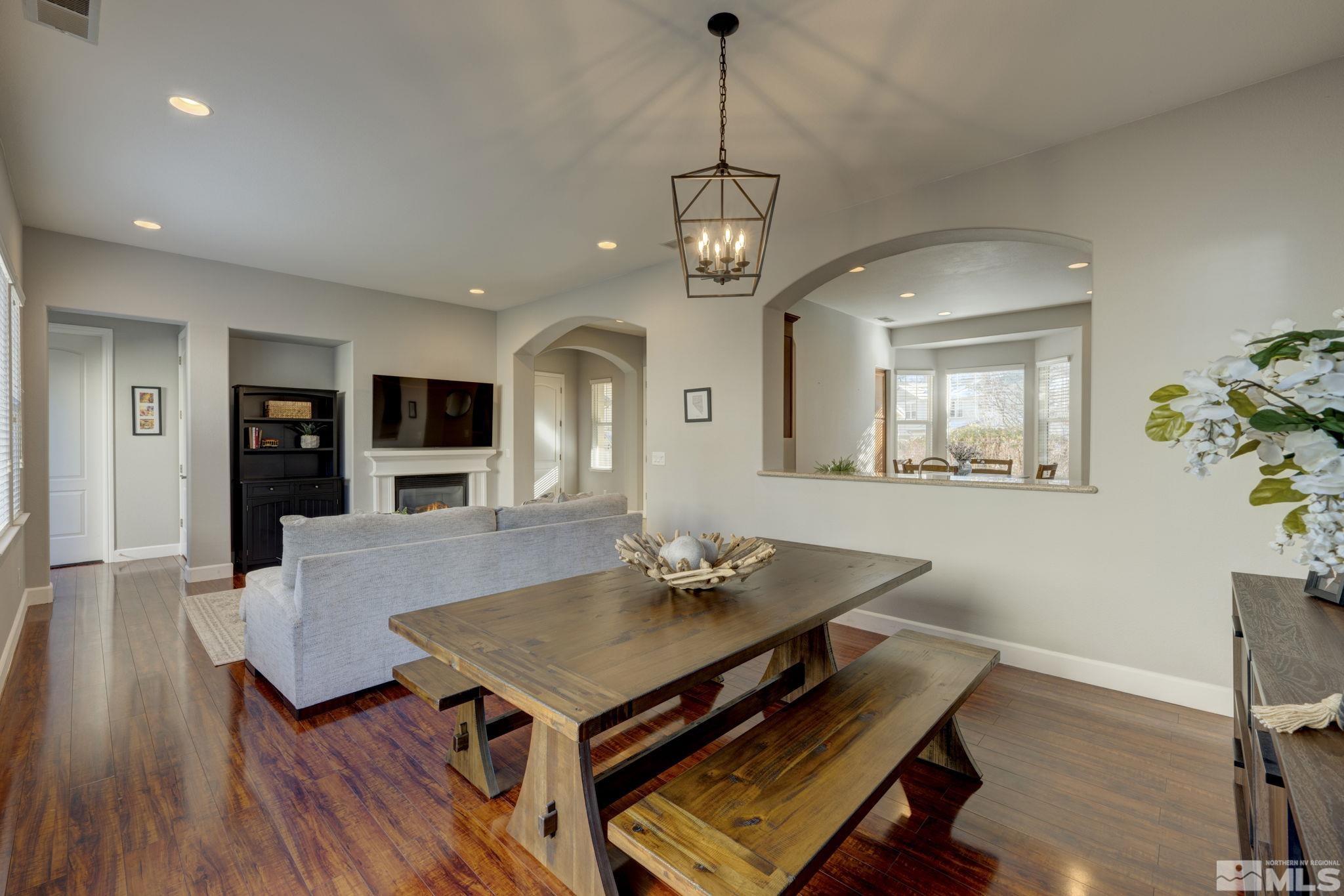 7669 Stone Bluff Way Reno, NV 89523 - Photo 7 of 40 a living room with furniture and a table