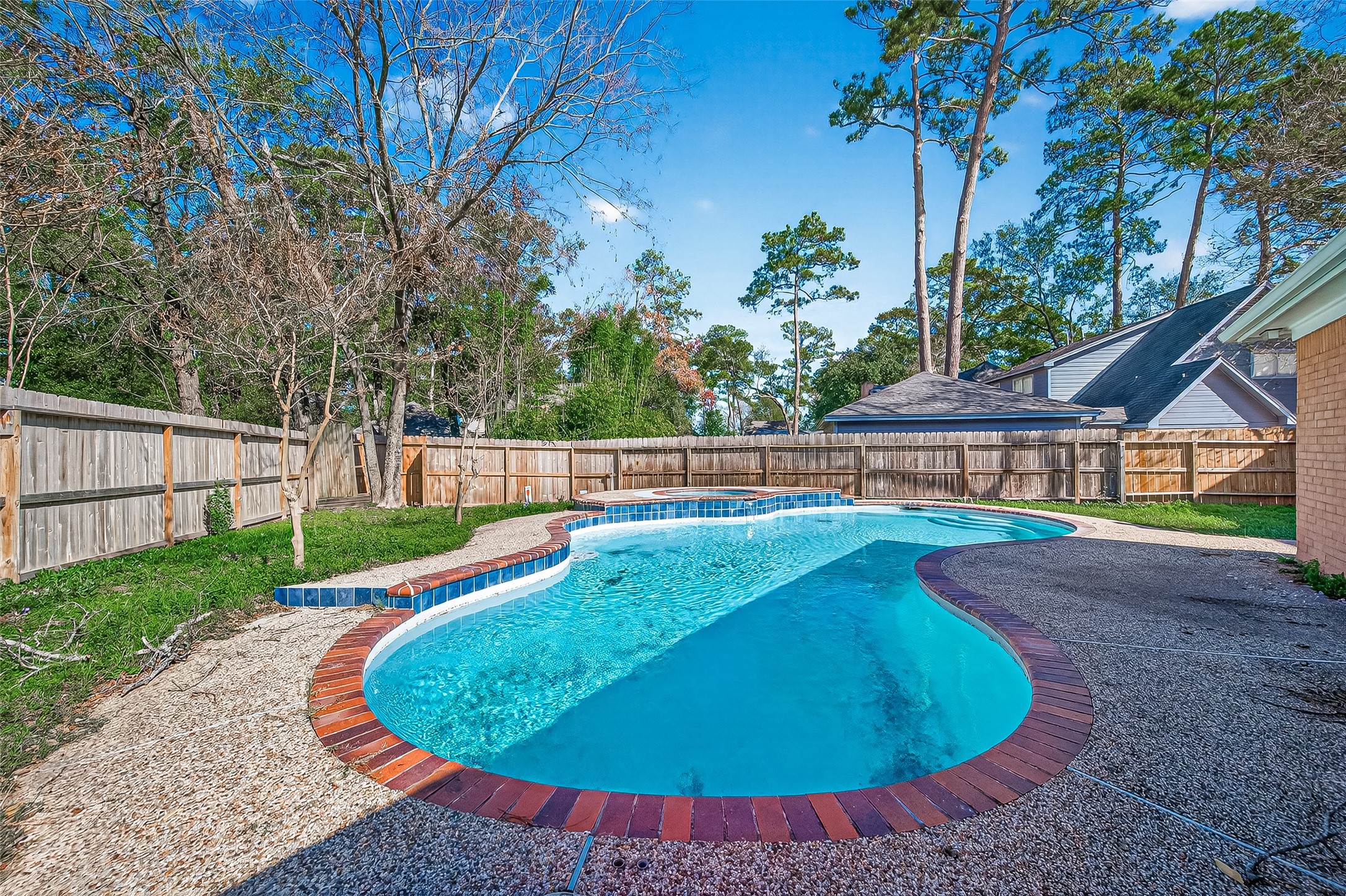 6210 Rippling Hollow Drive Spring, TX 77379 - Photo 11 of 50 a view of a swimming pool with an outdoor space