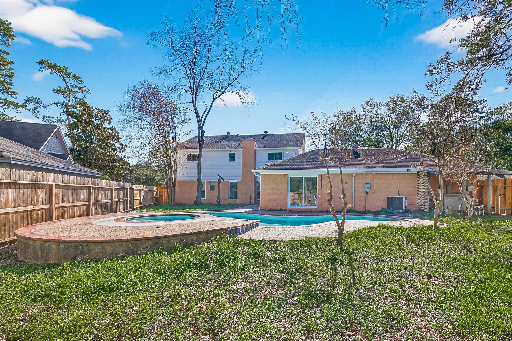 6210 Rippling Hollow Drive Spring, TX 77379 - Photo 12 of 50 a front view of a house with a yard and trees