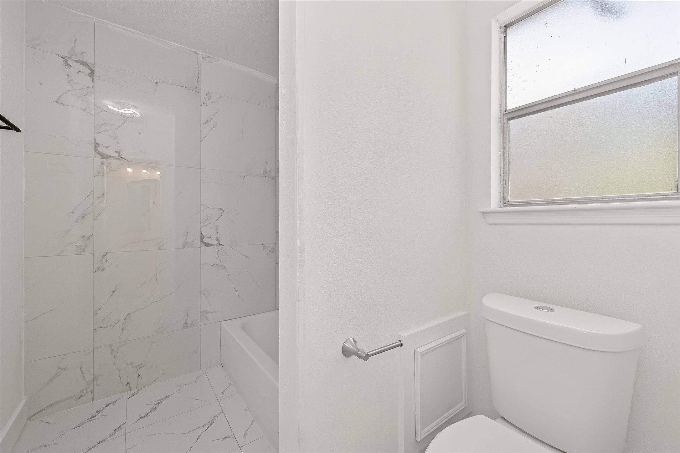 6210 Rippling Hollow Drive Spring, TX 77379 - Photo 40 of 50 a bathroom with a toilet and a shower