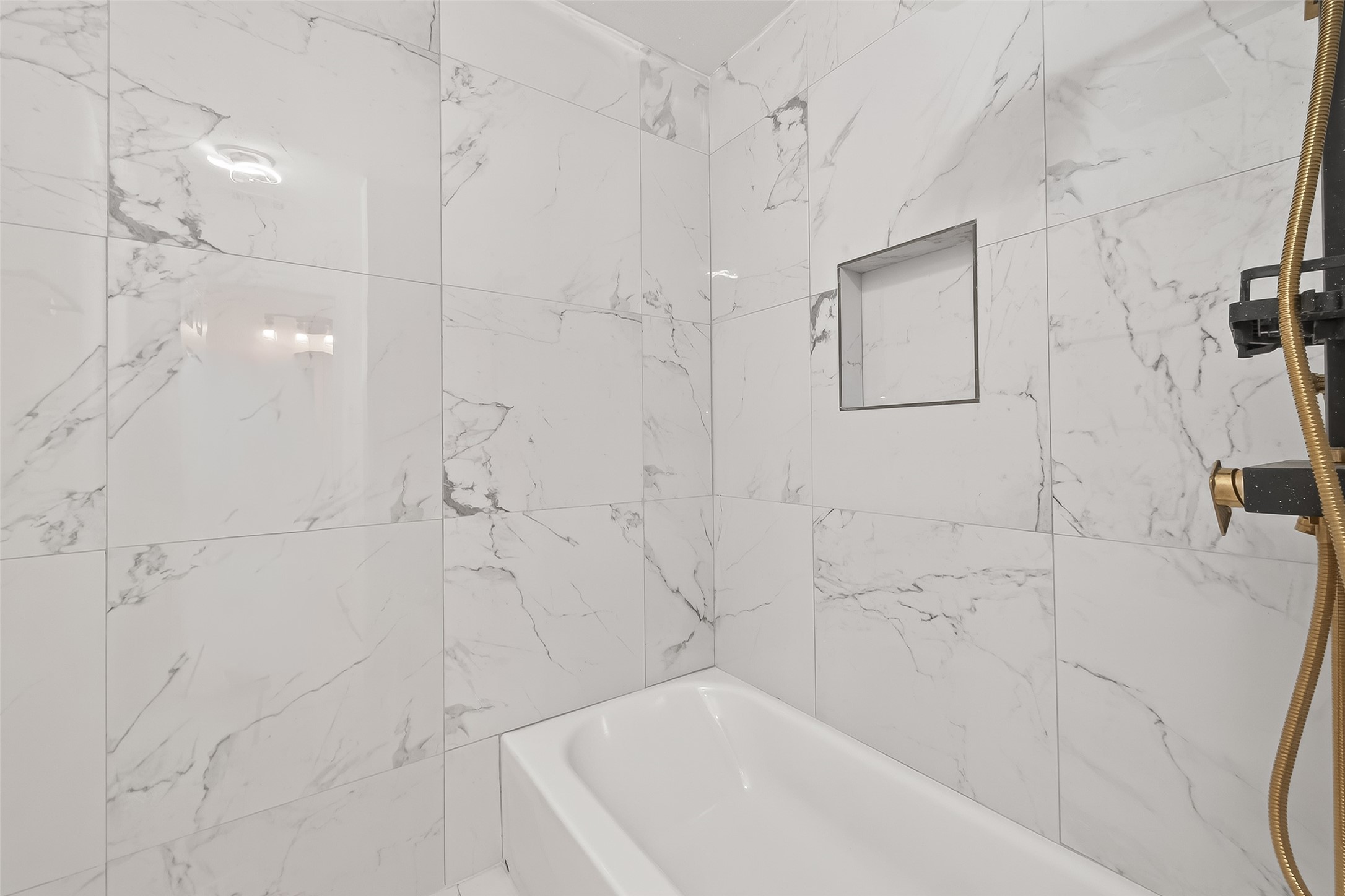 6210 Rippling Hollow Drive Spring, TX 77379 - Photo 41 of 50 a bathroom with a bathtub and shower