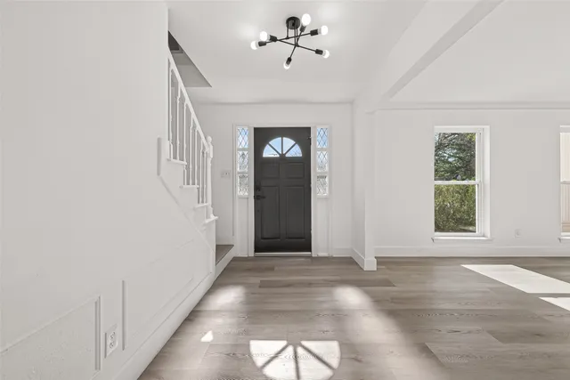a view of a hallway with windows