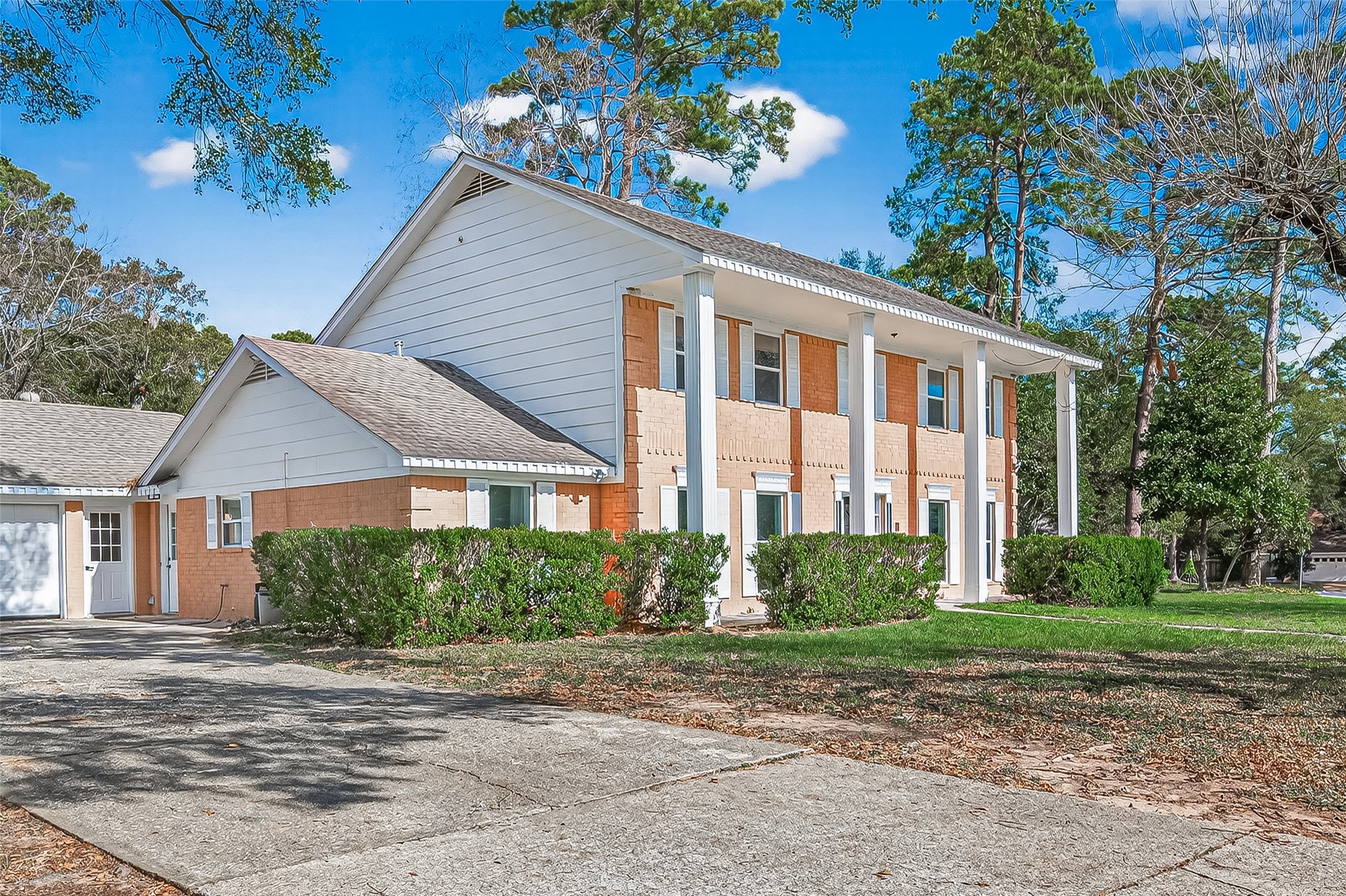 6210 Rippling Hollow Drive Spring, TX 77379 - Photo 9 of 50 a front view of a house with a garden