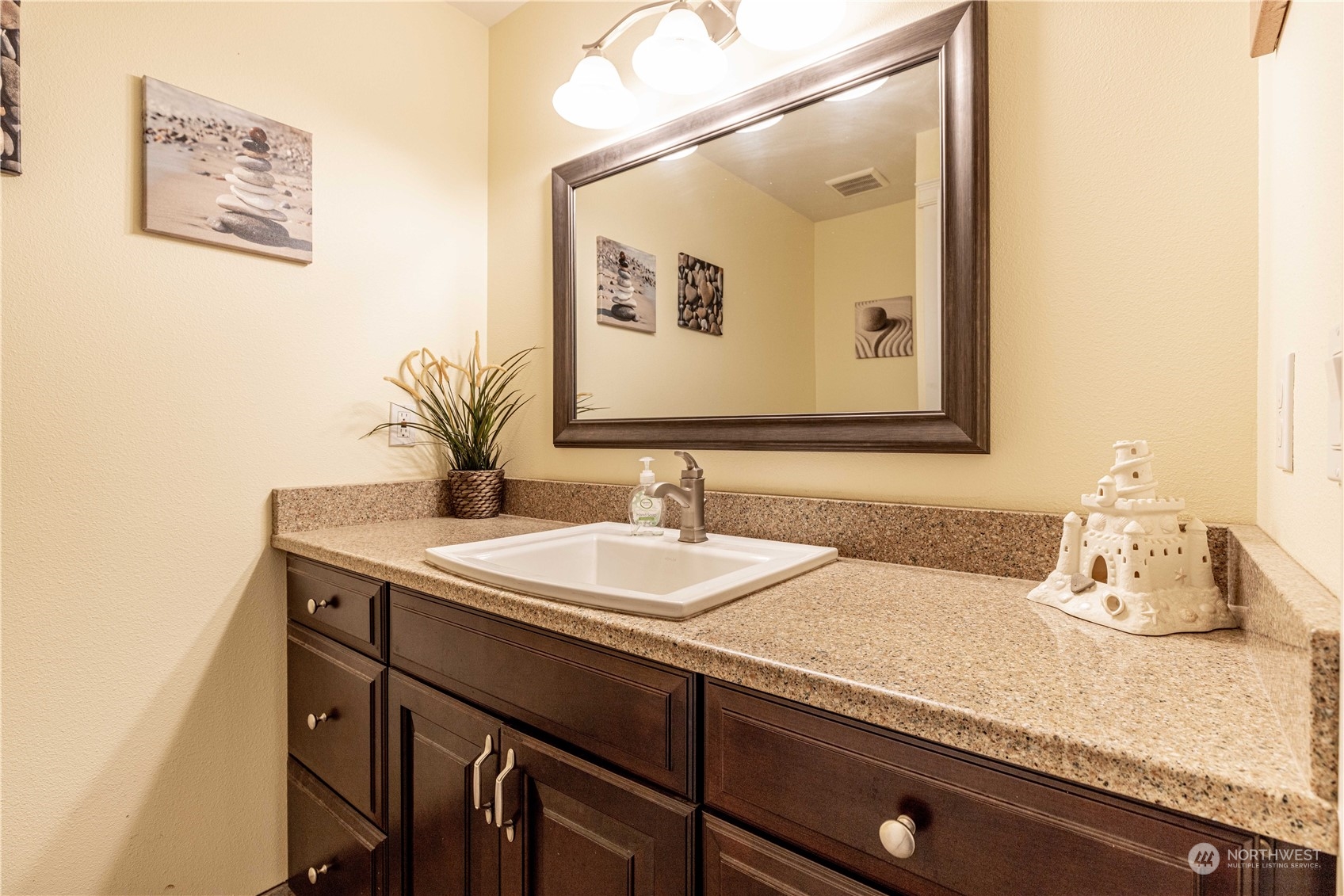 142 Literal Road Chehalis, WA 98532 - Photo 15 of 40 a bathroom with a sink and a mirror