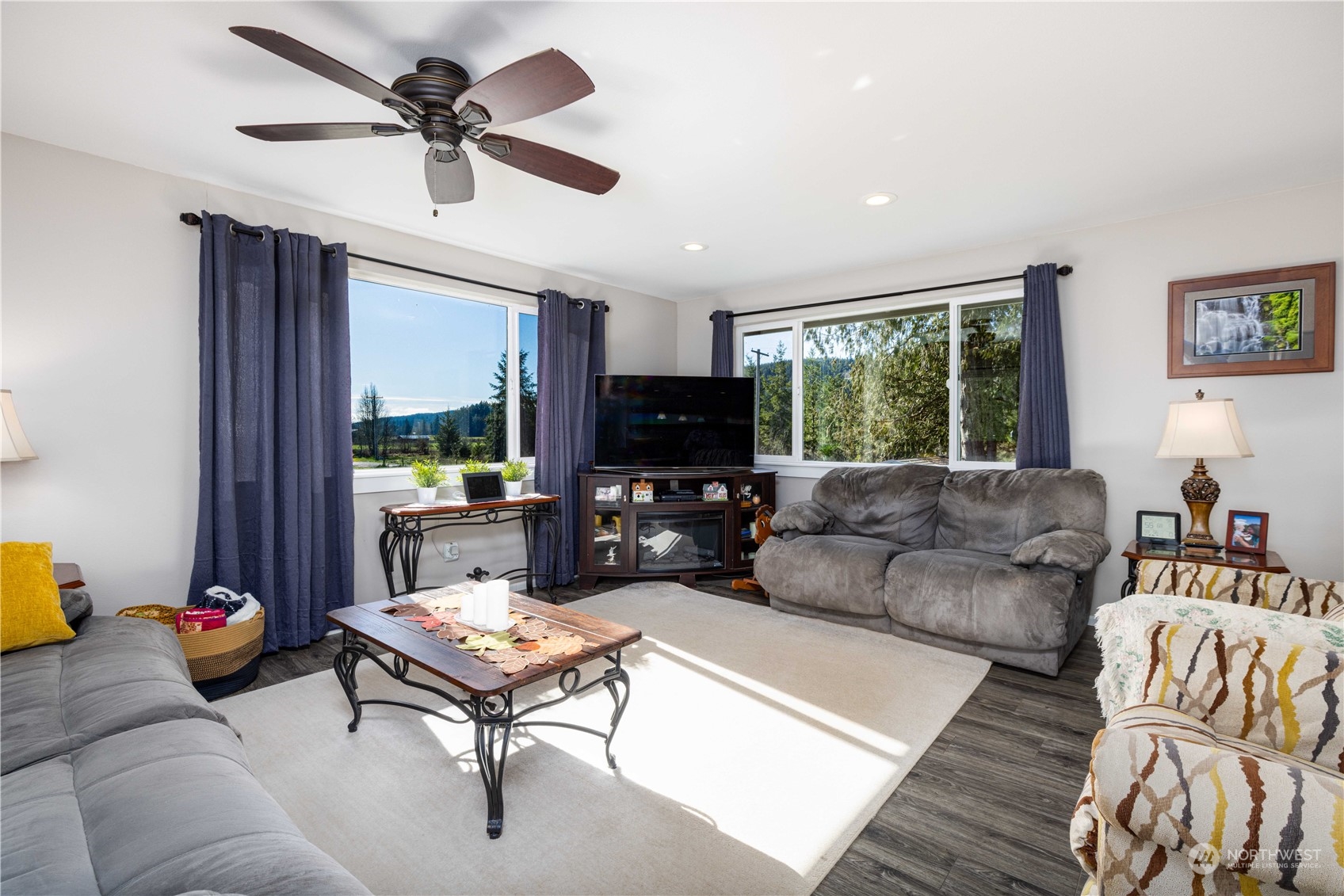 142 Literal Road Chehalis, WA 98532 - Photo 19 of 40 a living room with furniture and a flat screen tv