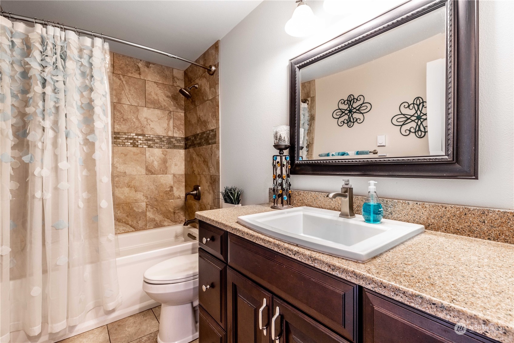 142 Literal Road Chehalis, WA 98532 - Photo 25 of 40 a bathroom with a sink a toilet and shower