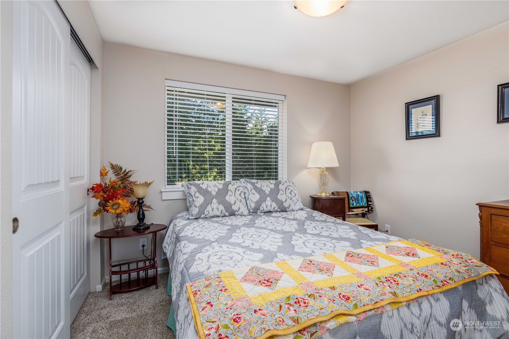 142 Literal Road Chehalis, WA 98532 - Photo 26 of 40 a bedroom with a bed and a lamp