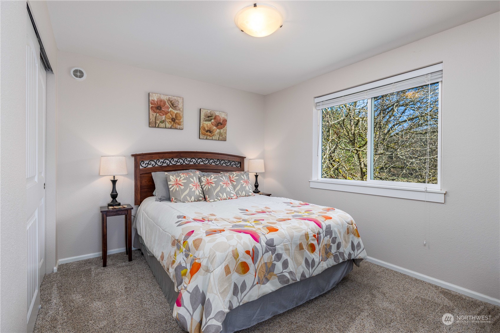 142 Literal Road Chehalis, WA 98532 - Photo 27 of 40 a bedroom with a bed and a window