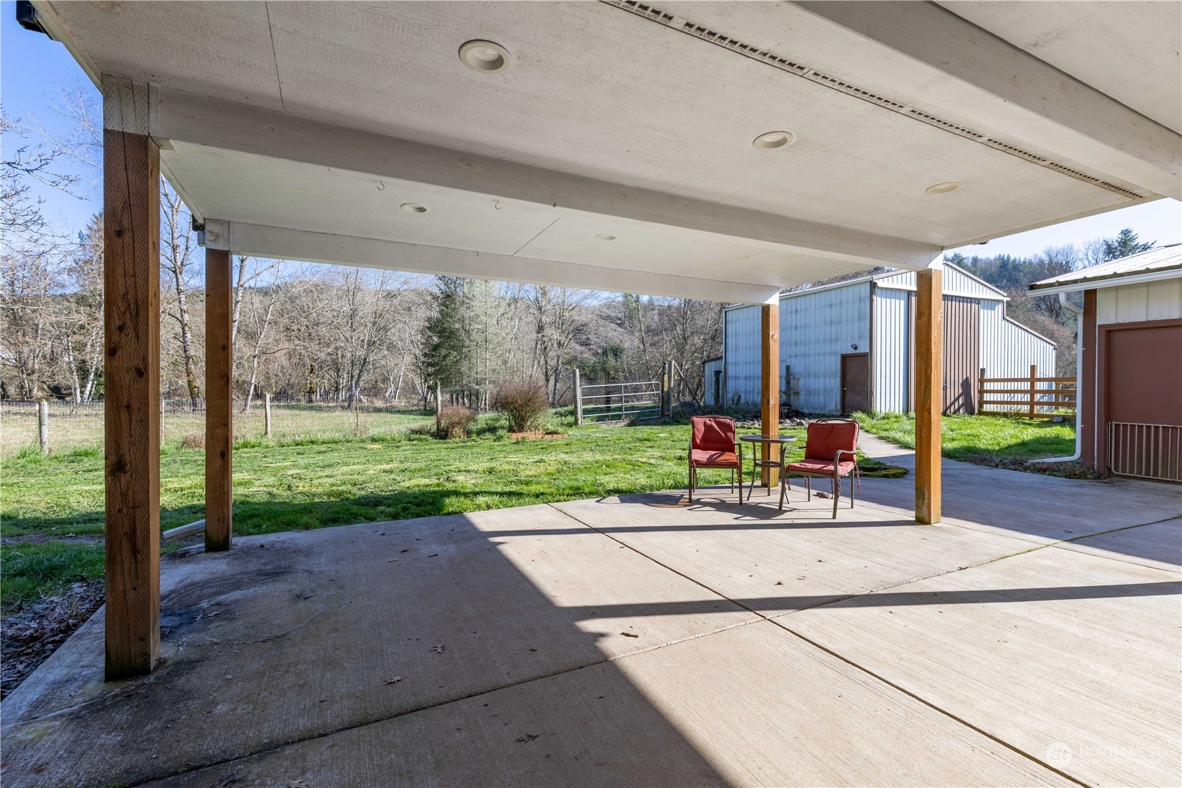 142 Literal Road Chehalis, WA 98532 - Photo 28 of 40 a view of a patio with a backyard