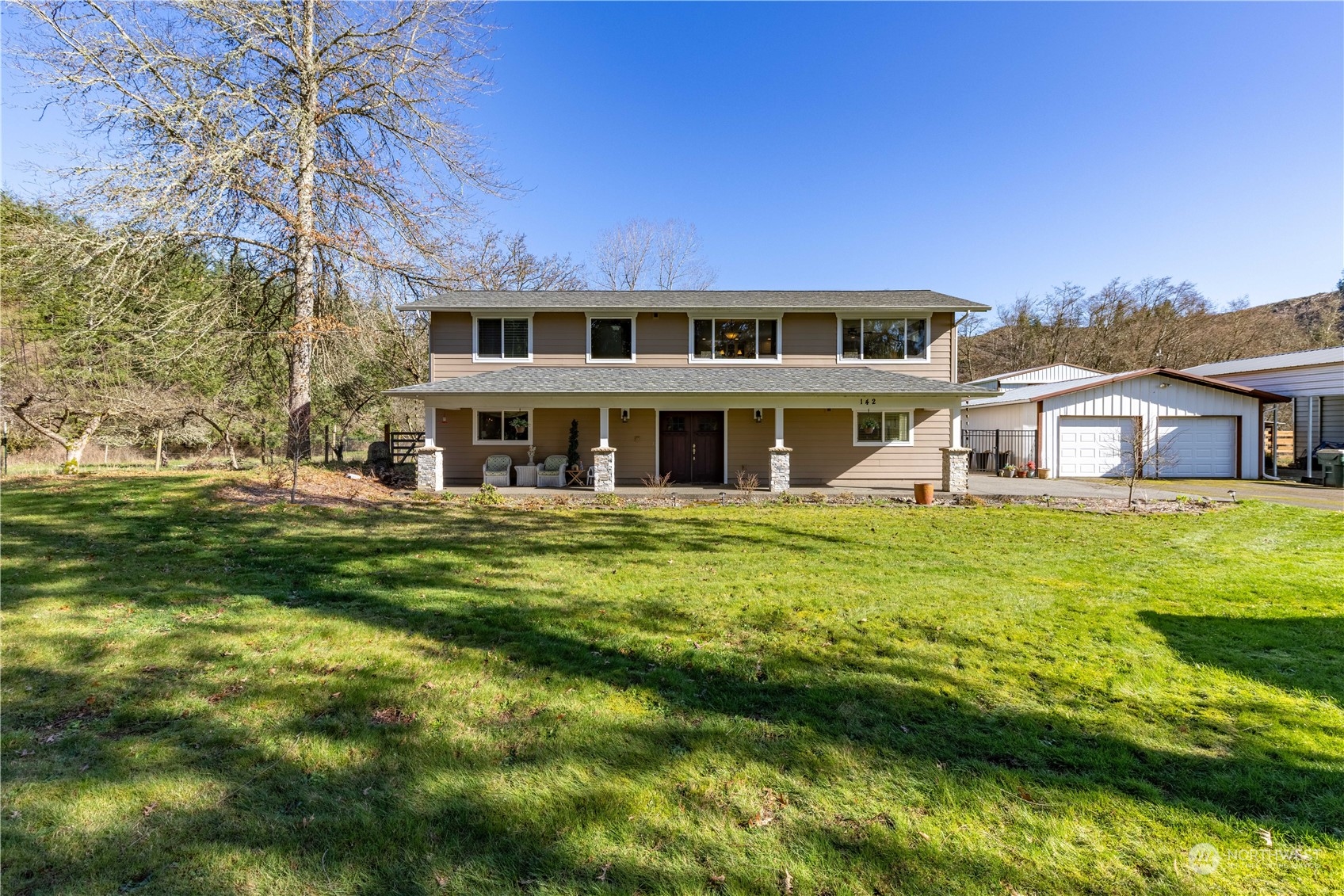 142 Literal Road Chehalis, WA 98532 - Photo 3 of 40 a front view of a house with a garden