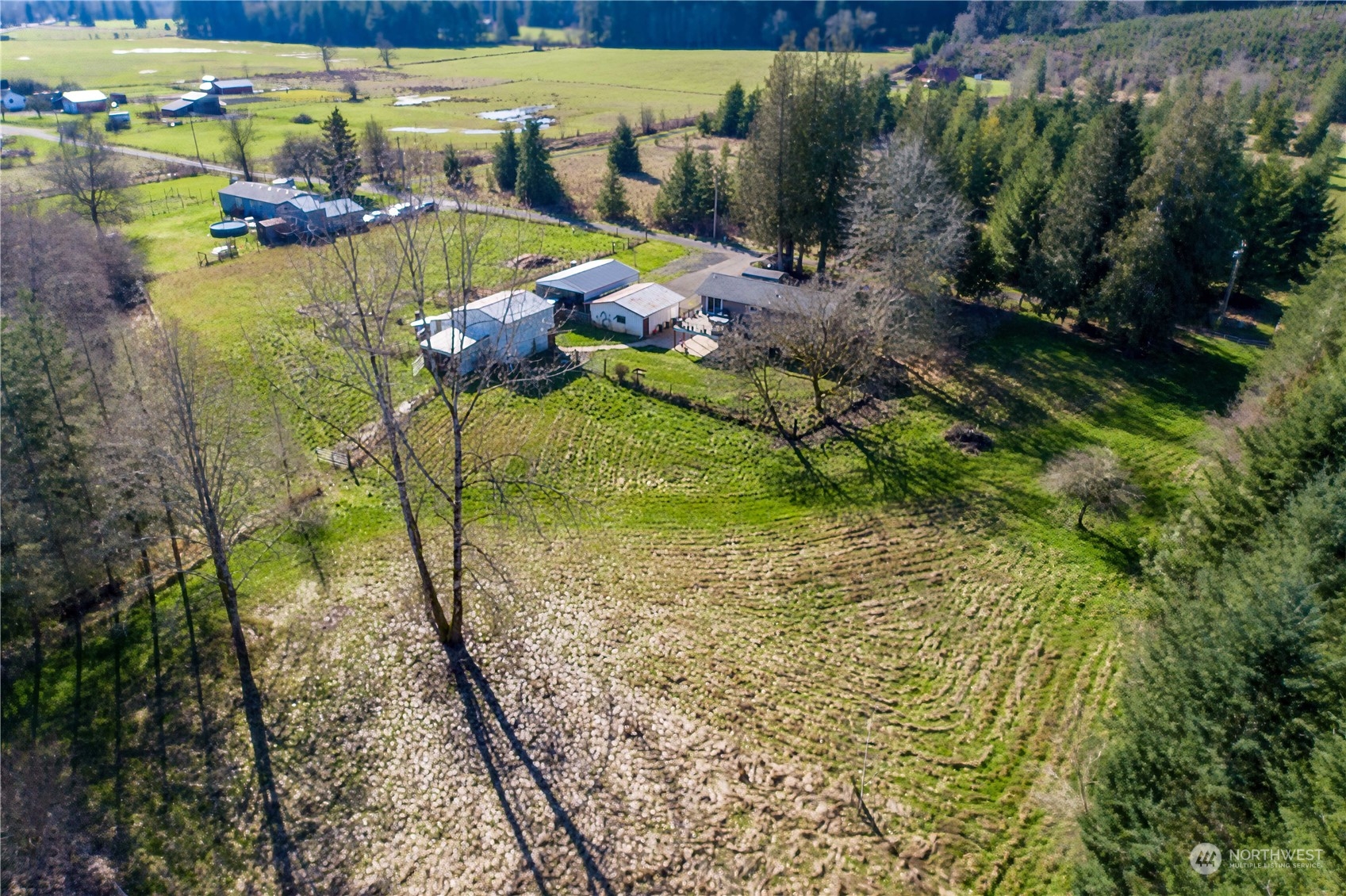 142 Literal Road Chehalis, WA 98532 - Photo 36 of 40 a view of swimming pool with a garden