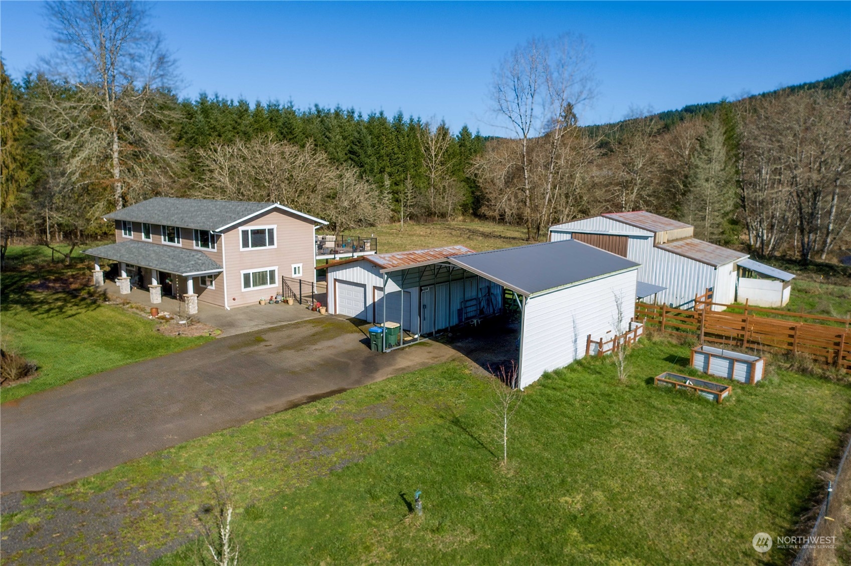 142 Literal Road Chehalis, WA 98532 - Photo 8 of 40 a aerial view of a house with a yard