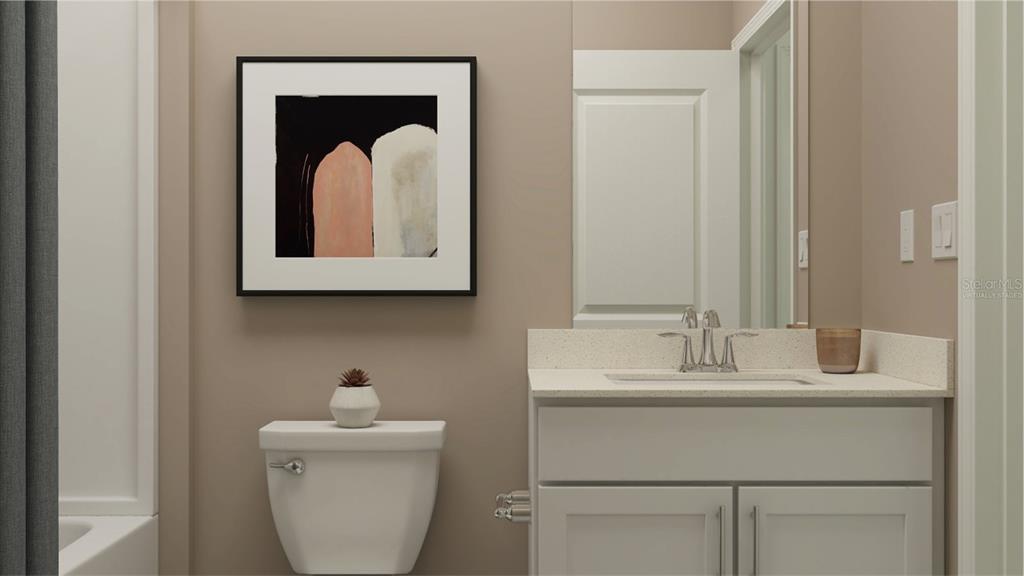 1660 Rider Rain Lane Apopka, FL 32703 - Photo 6 of 29 a bathroom with a toilet sink and mirror