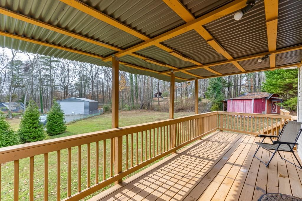 2838 North Bogan Road Northeast Buford, GA 30519 - Photo 29 of 39 a view of balcony with wooden floor