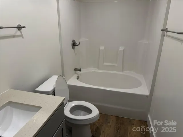 a bathroom with a sink and a vanity