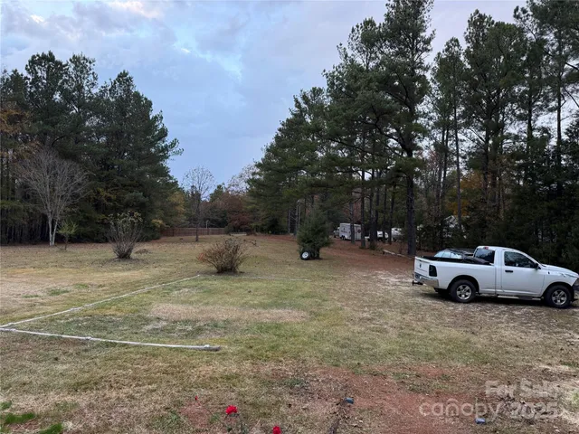 a view of street with parked cars