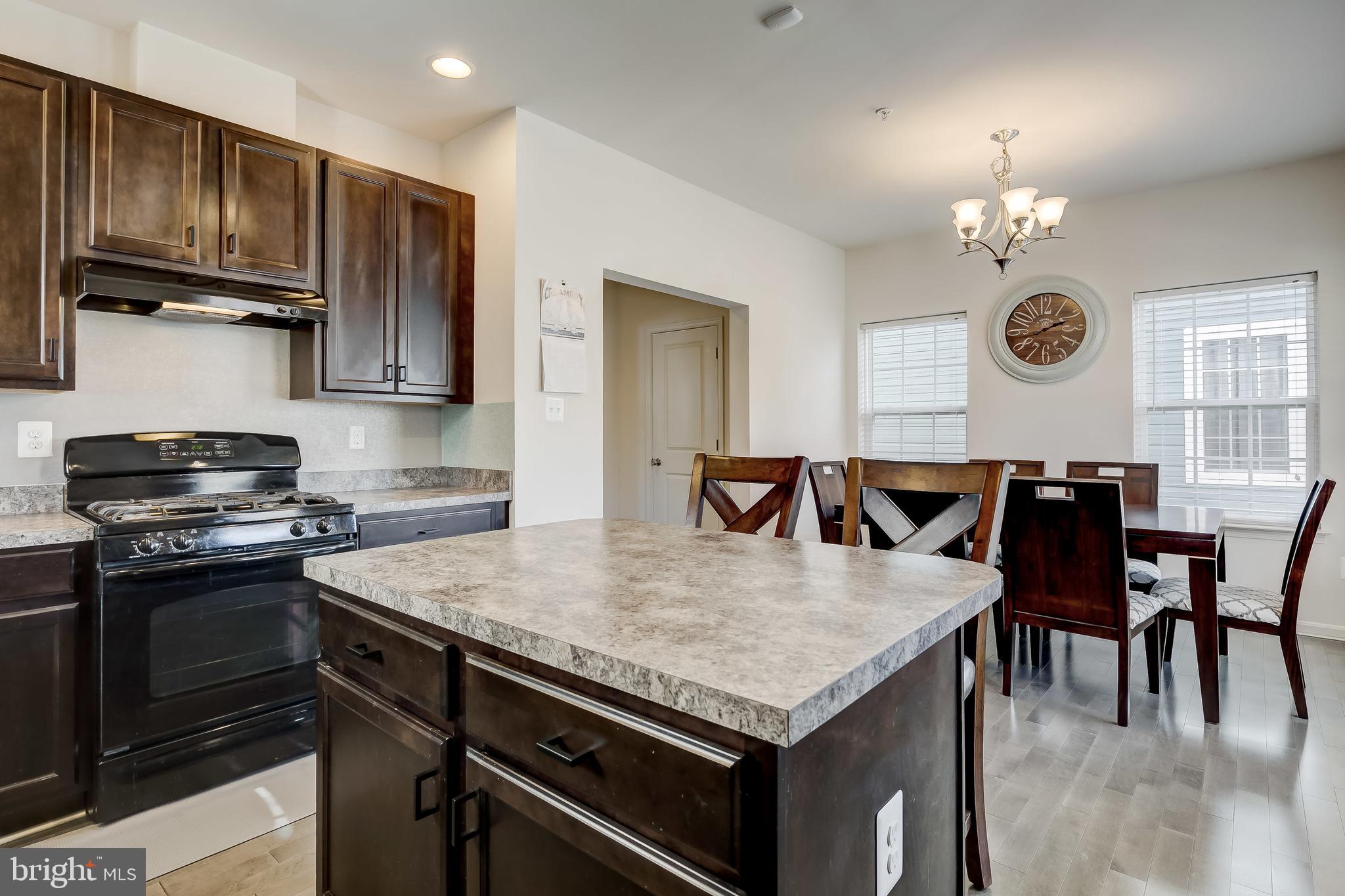 1638 Renaissance Drive Baltimore, MD 21221 - Photo 7 of 29 Kitchen - Recessed Lights, Wood Flooring