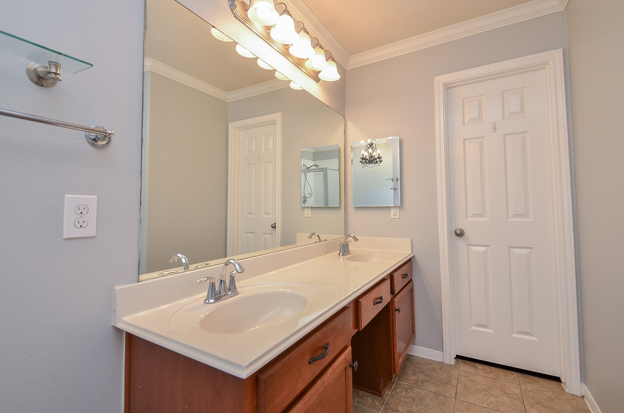25226 Diamond Ranch Drive Katy, TX 77494 - Photo 16 of 28 a bathroom with a sink and a mirror