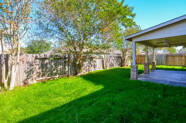 a view of a porch with a backyard