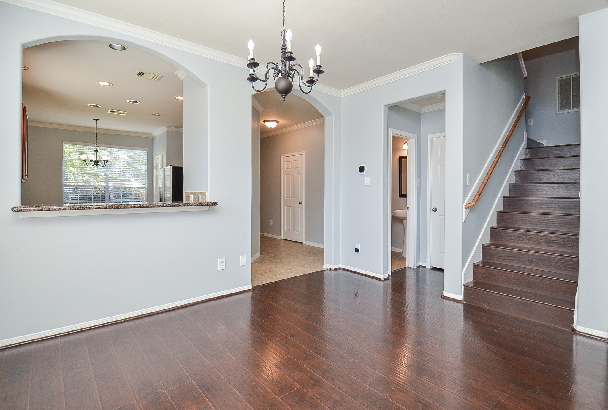 25226 Diamond Ranch Drive Katy, TX 77494 - Photo 9 of 28 wooden floor in an empty room with a window