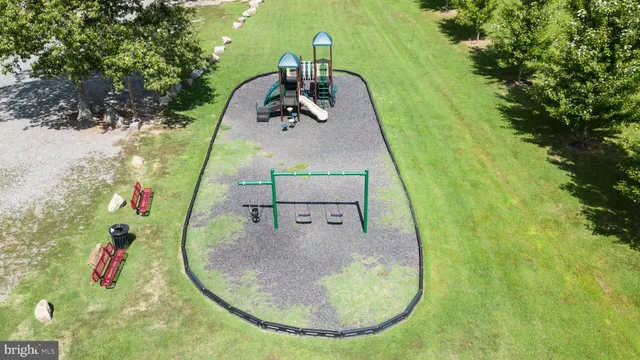 a view of backyard with green space