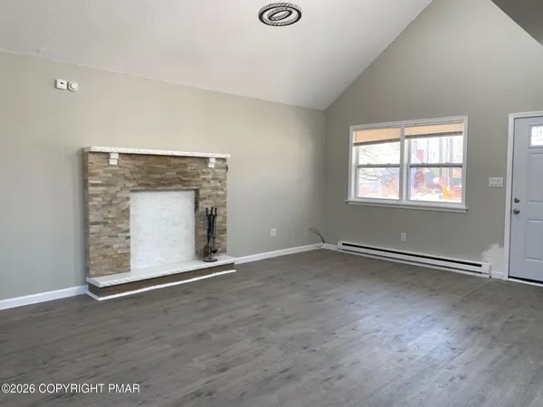 an empty room with windows