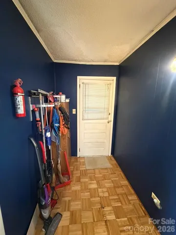 a view of a livingroom with storage & utility room