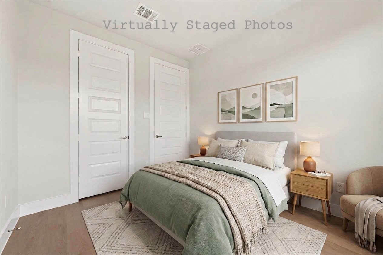 10719 Mason Road, Unit 26 Richmond, TX 77406 - Photo 11 of 50 Virtual Staging - Modern bedroom features a cozy bed with soft green bedding, warm wood nightstands, and a comfortable tan armchair in the corner