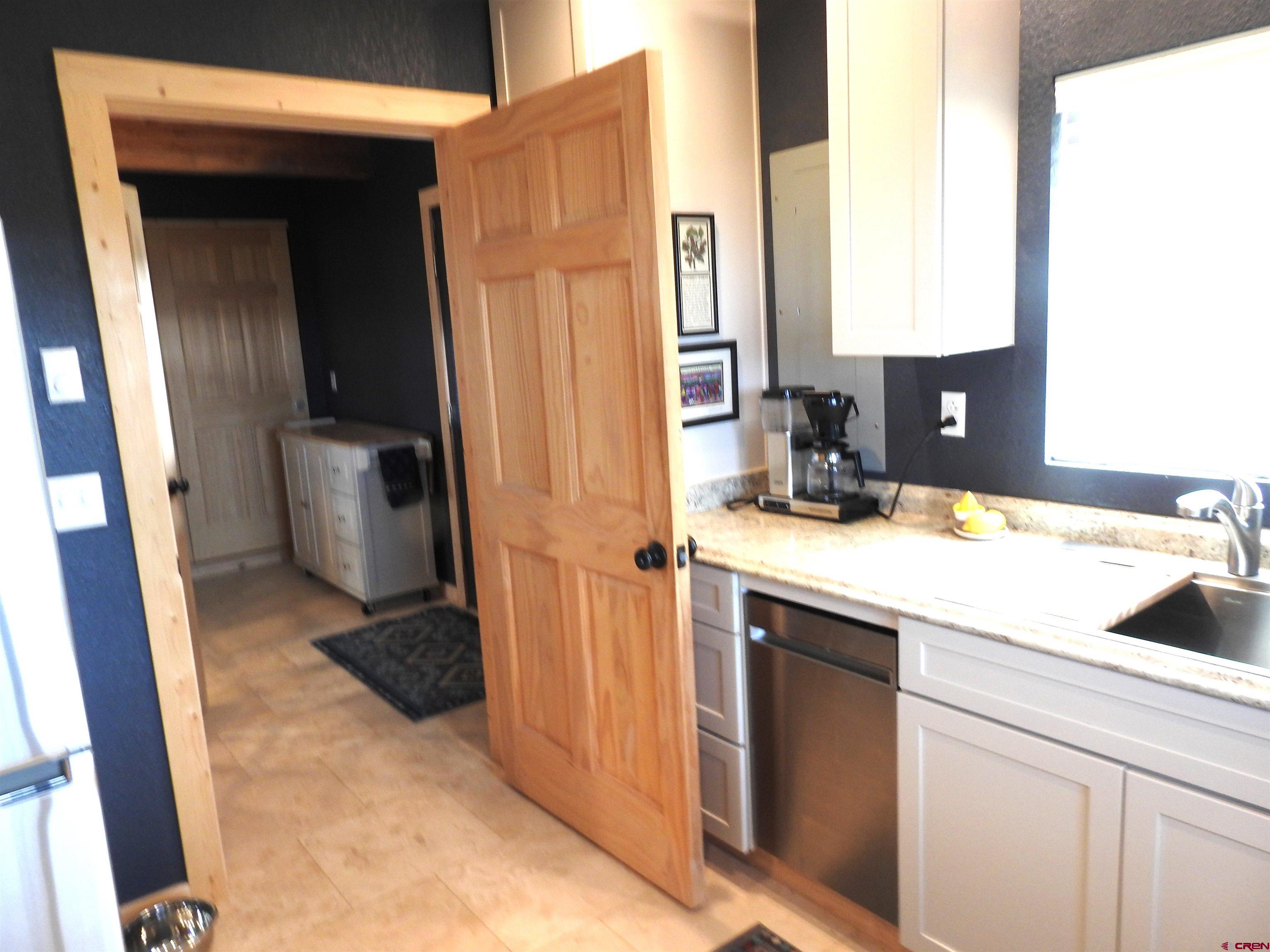 34099 Rd M Mancos, CO 81328 - Photo 13 of 37 a bathroom with a sink and a mirror