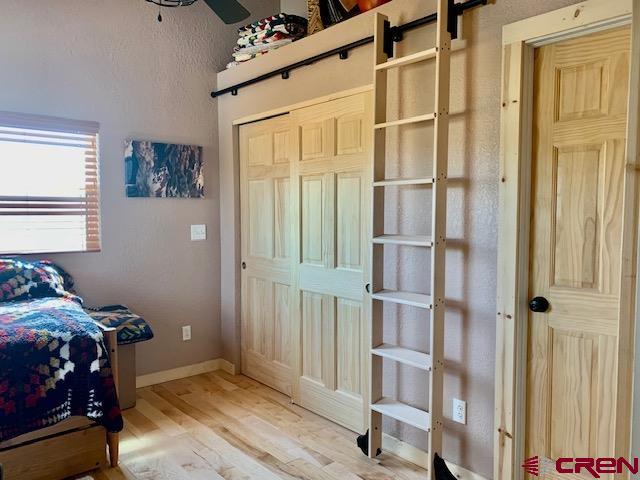 34099 Rd M Mancos, CO 81328 - Photo 19 of 37 a view of a livingroom with furniture and windows