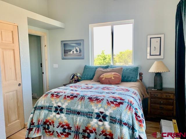 34099 Rd M Mancos, CO 81328 - Photo 20 of 37 a bedroom with a bed and a window