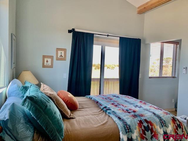 34099 Rd M Mancos, CO 81328 - Photo 21 of 37 a bedroom with a bed and a window