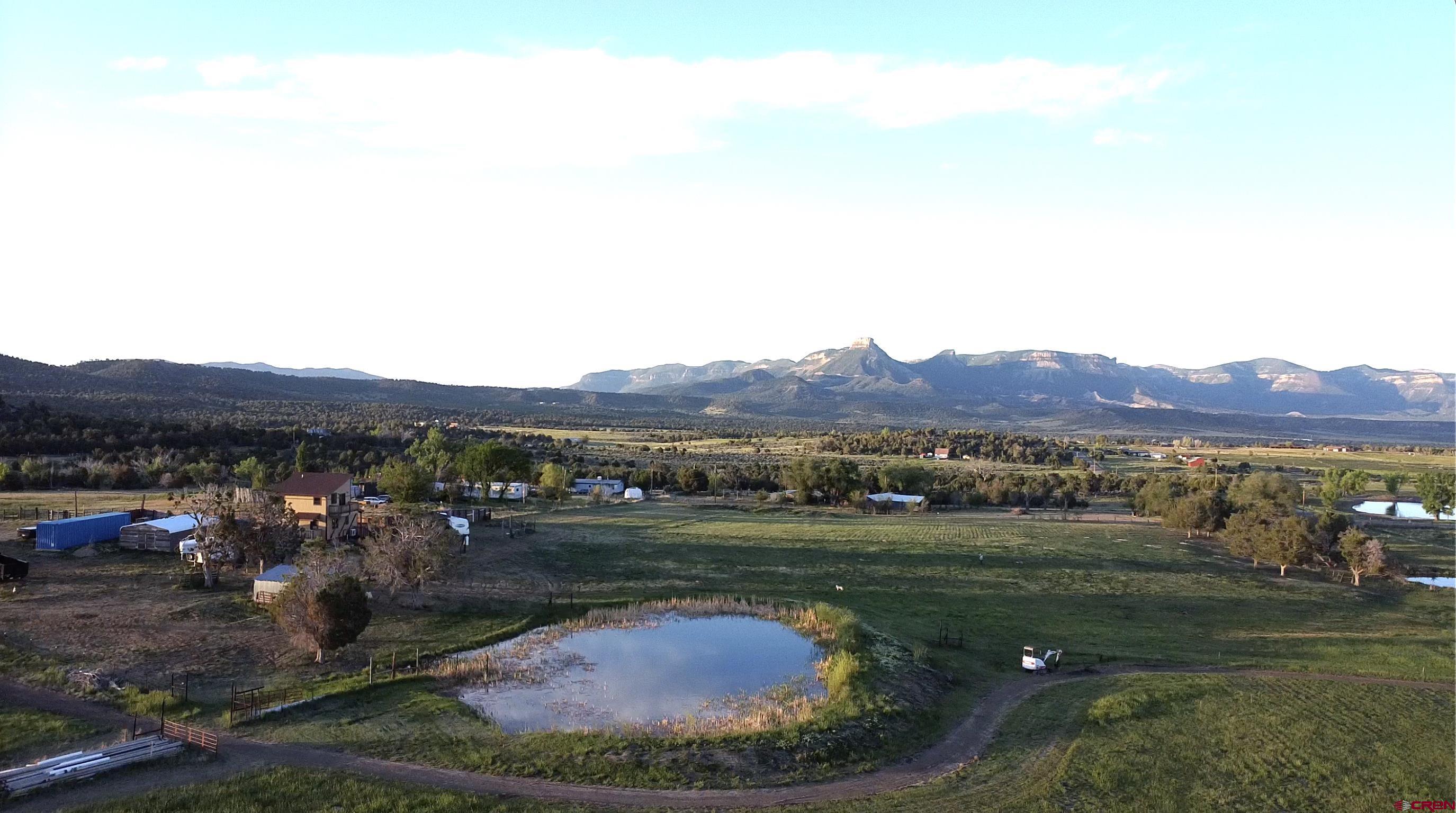34099 Rd M Mancos, CO 81328 - Photo 3 of 37 a view of a town with mountains in the background
