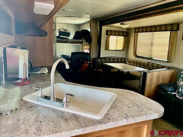 34099 Rd M Mancos, CO 81328 - Photo 37 of 37 a view of a kitchen with a sink and a large window