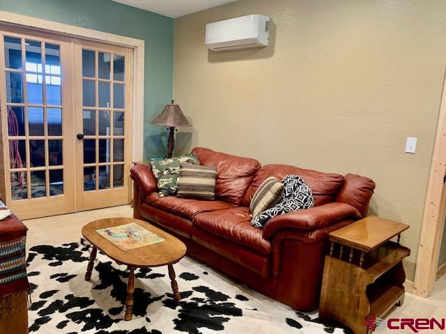 34099 Rd M Mancos, CO 81328 - Photo 7 of 37 a living room with furniture and a rug