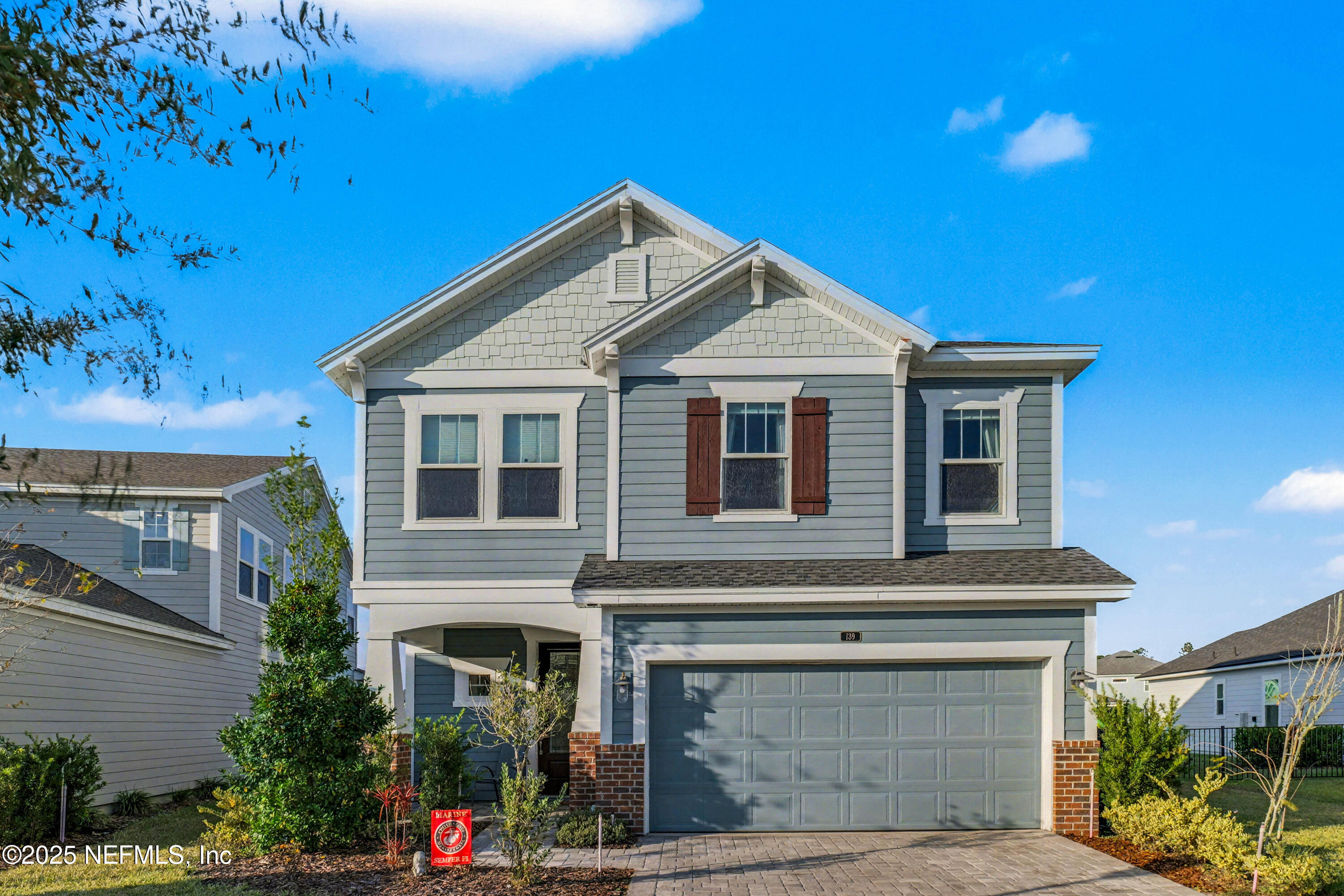 139 Spinner Drive Ponte Vedra, FL 32081 - Photo 1 of 67 a front view of a house with a yard