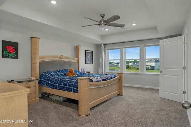 a bathroom with a double vanity sink mirror and shower