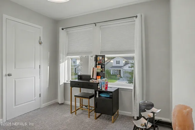 a bathroom with a sink double vanity and a mirror